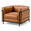 Poltrona in similpelle marrone cognac con struttura in metallo nero, 86 × 82 × 72 cm